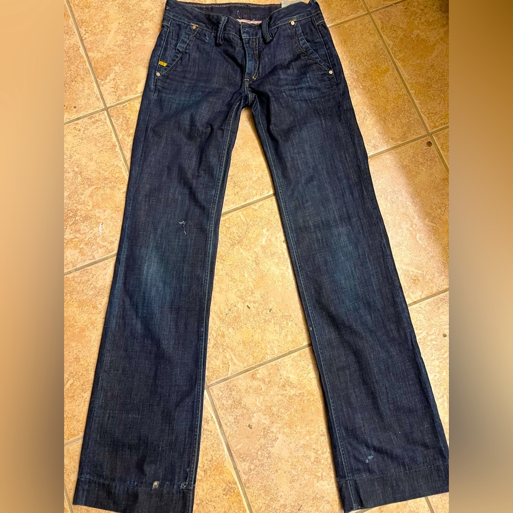 Never worn before but washed once woman’s jeans size 28